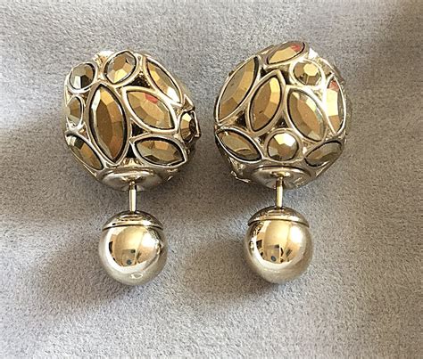 mise en dior tribal earrings|Dior tribal earrings marble.